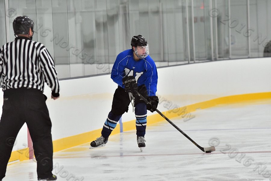 Wheaton College Men\'s Ice Hockey vs Middlesex Community College. - Photo By: KEITH NORDSTROM